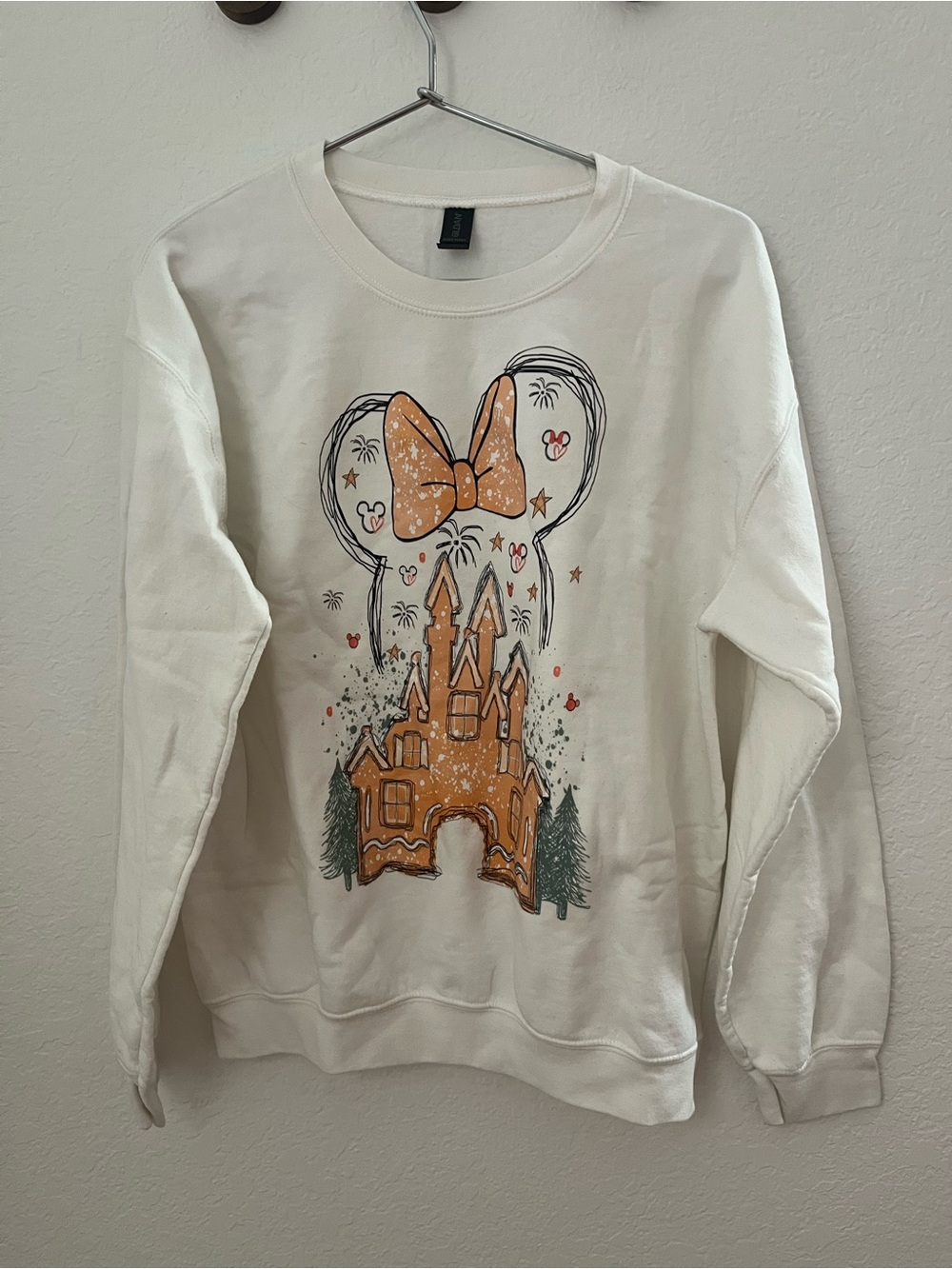 Amazon Cream Sweatshirt with Orange Castle & Bow Graphic